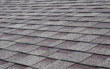 Swingbrow tiles for shallow pitch roofing